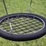 Ayunan lingkaran hitam Single Swing (BNS 90cm) dengan jaring tali kuat untuk taman bermain anak-anak.